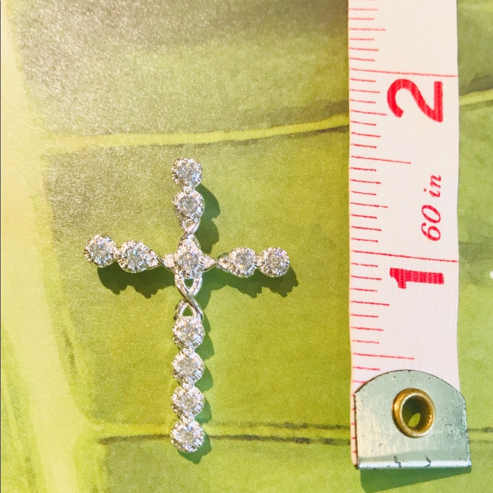New in box Silver and crystal cross.